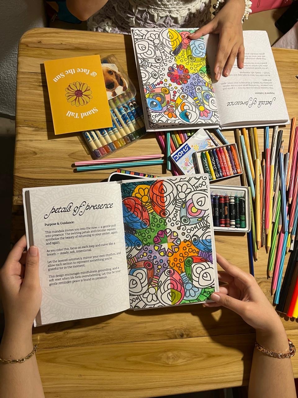 A journal spread and art materials in a session