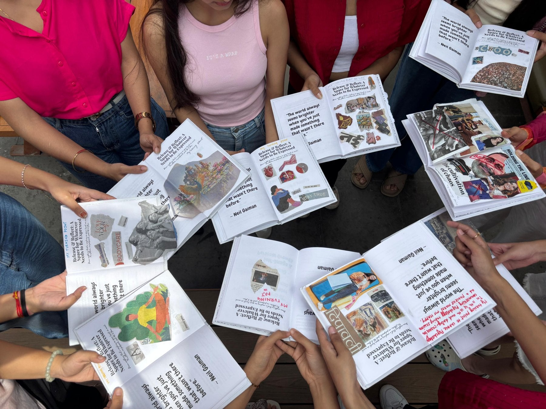 Learners sharing the journals they made together