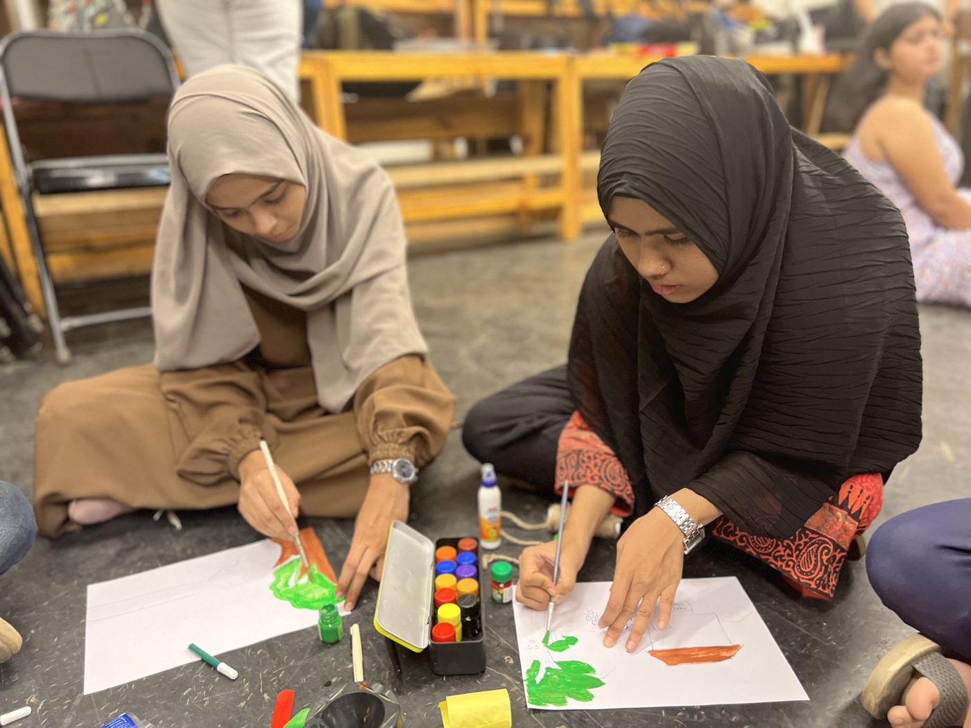 Students painting together